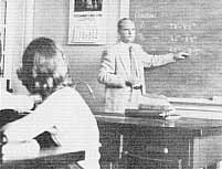 1955 Photo of Phil Clites teaching algebra and trigonometry